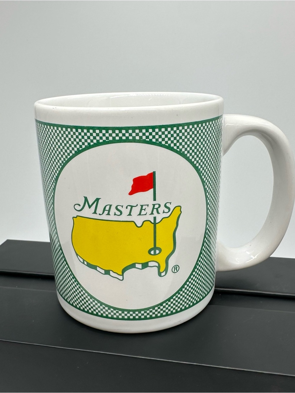 Masters White Mug with Green Border and Yellow Map Logo